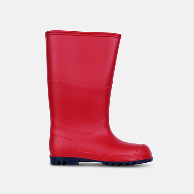 A red classic wellington boot with a navy blue sole is displayed on a white background.